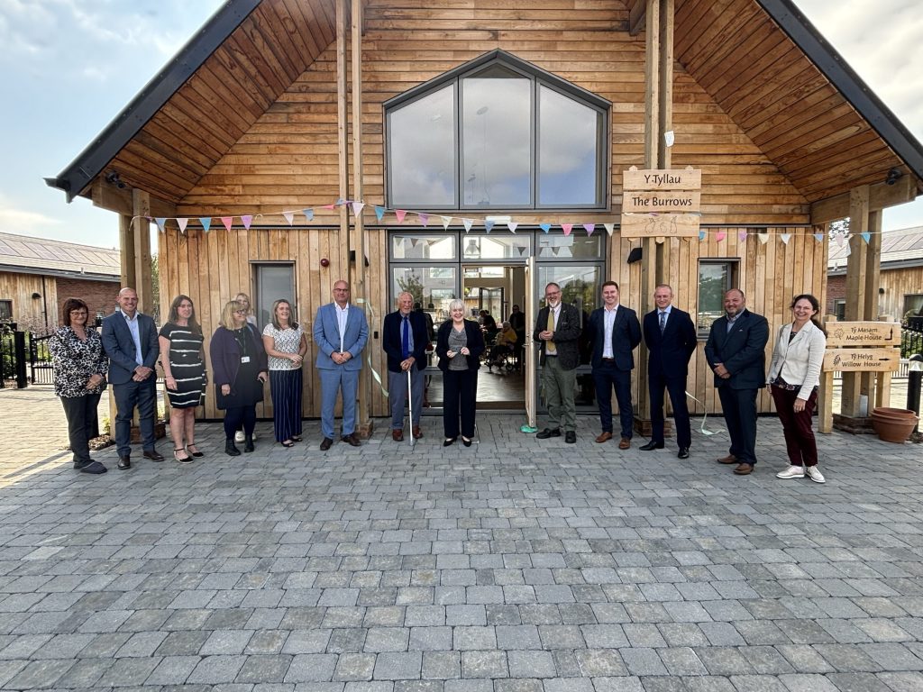 Council Leader Cllr Mary Ann Brocklesby and guests in front of the Village Hall at Severn View Park Care Home